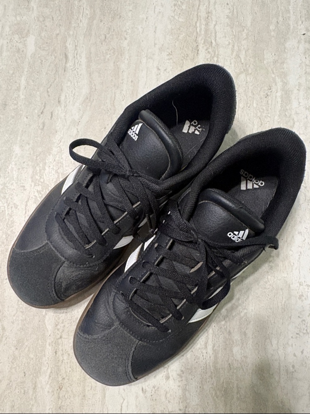 adidas Low-Top Lace-Up Sneakers with White Stripes. Fits like a woman’s size 8